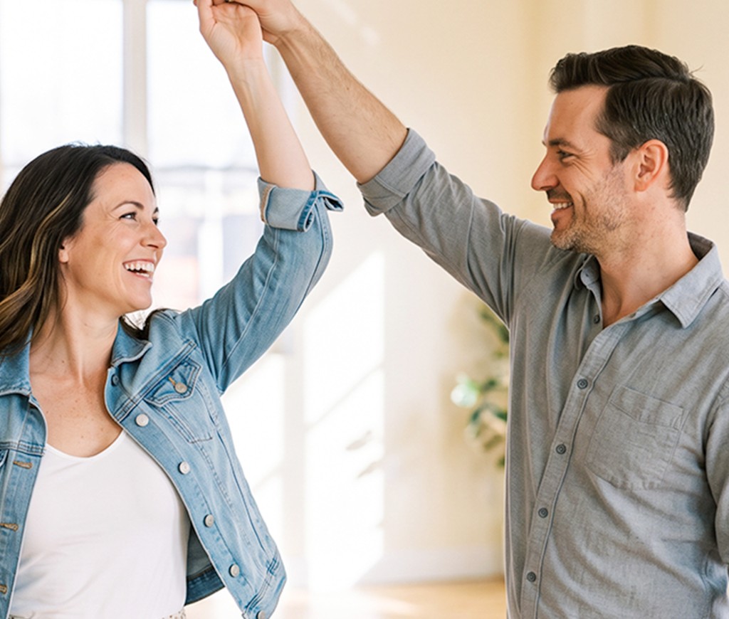 Couple smiling while social dancing together